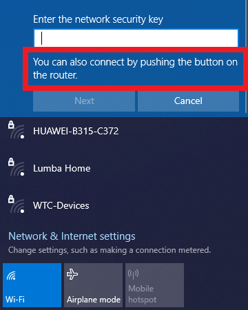 Windows very vague: "You can also connect by pushing the button on the router."